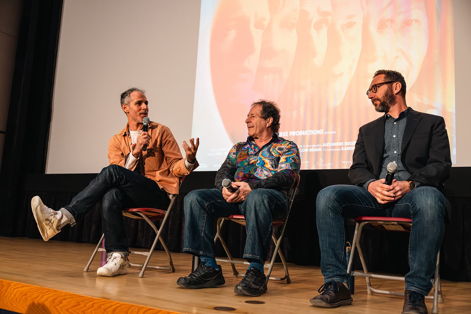 Andrew Rose with Rick Doblin and Dr. Joe Flanders on stage